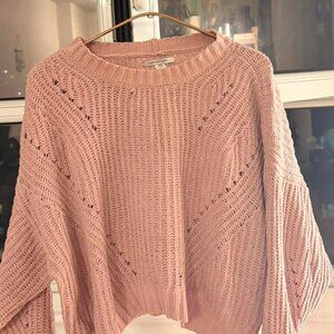 Pink knitted sweater with a relaxed fit #knitwear